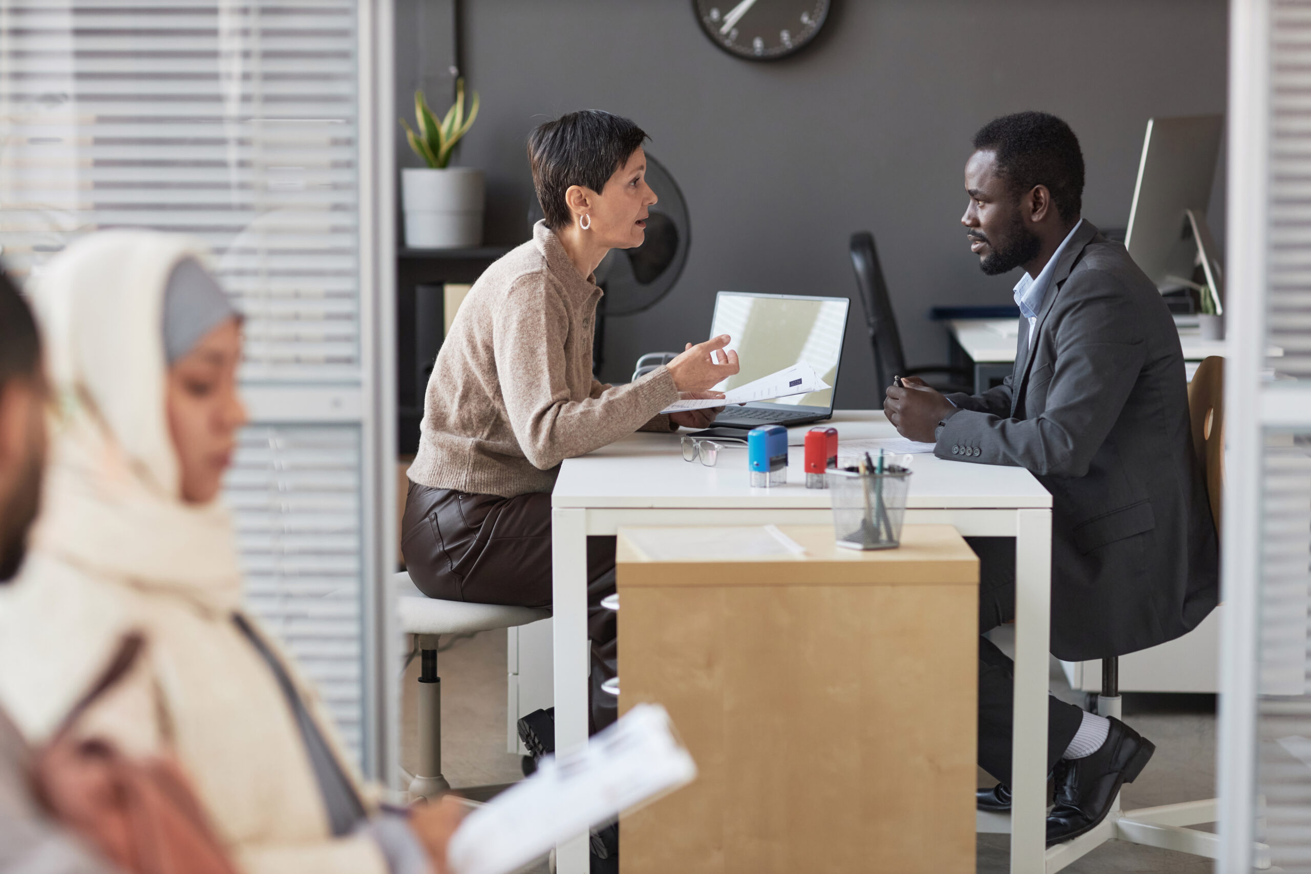 A new hire and manager talking about employee's career stability.